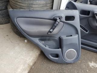 Обшивка двери задняя левая Toyota Rav 4 2004