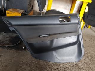 Обшивка двери задняя левая Mitsubishi Lancer 2004