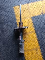 Амортизатор задний левый Toyota Camry 2014