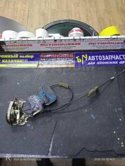 Запчасть замок двери задний левый MAZDA DEMIO