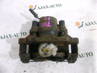 Суппорт передний левый MAZDA DEMIO