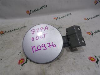 Фото запчасти лючок бензобака MITSUBISHI COLT контрактная запчасть Запчасть лючок бензобака MITSUBISHI COLT