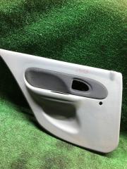 Обшивка двери задняя левая Renault Symbol 1