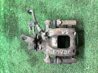 Запчасть суппорт задний левый Skoda Octavia