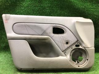 Обшивка двери передняя левая Renault Symbol 1 2003