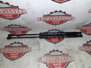 Амортизатор двери багажника задний TOYOTA VITZ 2011