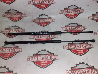 Амортизатор двери багажника задний MAZDA DEMIO 2016