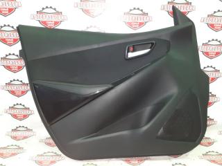 Обшивка дверей передняя левая MAZDA DEMIO 2016