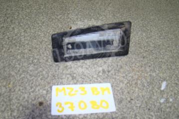 Запчасть фонарь подсветки номера Mazda 3
