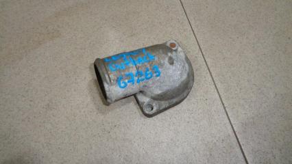 Фото запчасти крышка термостата Subaru Outback 2010 Б/У запчасть Запчасть крышка термостата Subaru Outback 2010