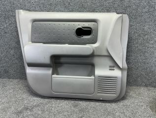 Обшивка дверей передняя левая Nissan Cube 2003