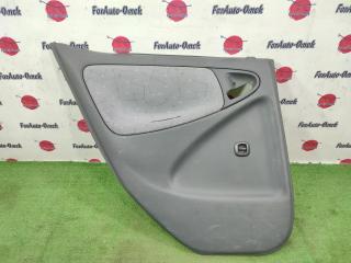 Обшивка дверей задняя левая TOYOTA VITZ 2000