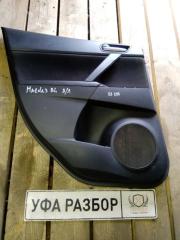 Запчасть обшивка двери задняя левая Mazda 3 2009-2013