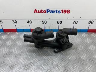 Фото запчасти корпус термостата Volkswagen Polo 2012 контрактная запчасть Запчасть корпус термостата Volkswagen Polo 2012