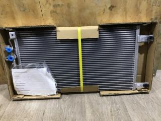Радиатор кондиционера Mitsubishi L200 96-06 новая Радиатор кондиционера Mitsubishi L200 96-06
