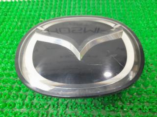 Запчасть эмблема передняя MAZDA Atenza 2012
