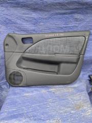 Обшивка двери передняя правая Toyota Caldina