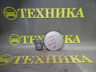 Лючок бензобака Mitsubishi Colt