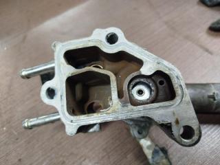Корпус термостата GEELY MK CROSS MR479QA