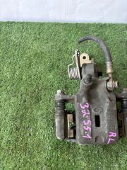 Суппорт задний левый CEFIRO P12