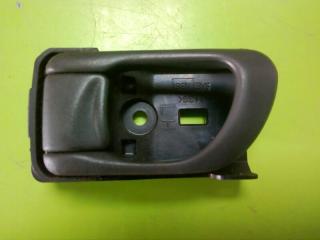 Фото запчасти ручка двери внутренняя левая Subaru Forester Б/У запчасть Запчасть ручка двери внутренняя левая Subaru Forester