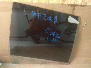 Запчасть стекло заднее левое Mazda Capella 2000
