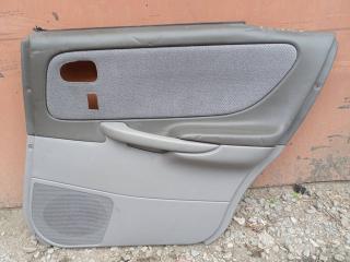 Запчасть дверная карта задняя правая Mazda Capella 2000