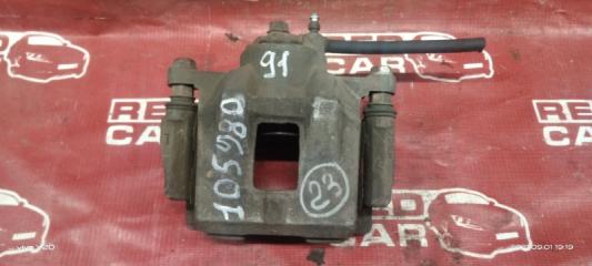 Суппорт передний левый TOYOTA RAUM