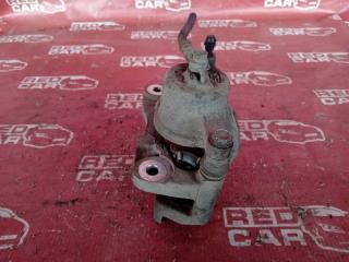 Суппорт передний левый TOYOTA VITZ NSP135 1NR
