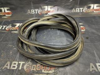 Уплотнительная резинка двери багажника MAZDA DEMIO 1999