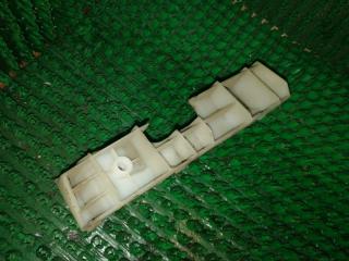 Запчасть кронштейн фары NISSAN Cube