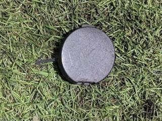 Запчасть заглушка буксировочного крюка передняя MITSUBISHI lancer