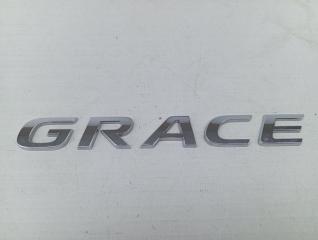 Запчасть эмблема задняя Honda Grace