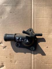 Фото запчасти фланец системы охлаждения MAZDA DEMIO 2010 Б/У запчасть Запчасть фланец системы охлаждения MAZDA DEMIO 2010