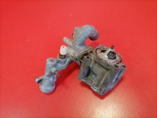 Фото запчасти корпус термостата Mitsubishi Pajero Sport 2000 Б/У запчасть Запчасть корпус термостата Mitsubishi Pajero Sport 2000