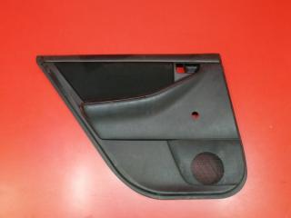 Обшивка двери задняя левая Toyota Corolla 2004 Б/У Обшивка двери задняя левая Toyota Corolla 2004