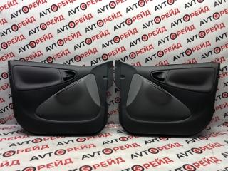 Фото запчасти обшивка двери Toyota Vitz 06.2001 контрактная запчасть Запчасть обшивка двери Toyota Vitz 06.2001