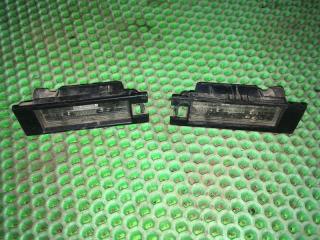 Фото запчасти подсветка номера Opel Astra 2007 Б/У запчасть Запчасть подсветка номера Opel Astra 2007