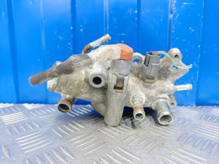 Фото запчасти фланец системы охлаждения Nissan Tiida 2016 контрактная запчасть Запчасть фланец системы охлаждения Nissan Tiida 2016