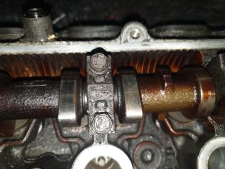 Головка блока цилиндров TOYOTA BB NCP35 1NZFE 3 ракурс