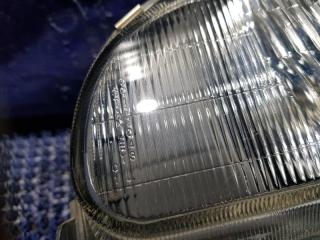 Фара левая передняя MITSUBISHI MINICA H22A 001-7043 4 ракурс