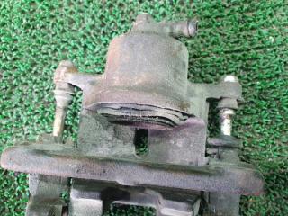 Суппорт правый передний TOYOTA FUNCARGO NCP25 1NZFE 4 ракурс