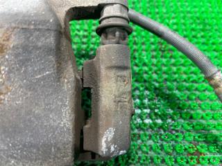 Суппорт левый передний TOYOTA PORTE NCP145 1NZFE 2 ракурс Суппорт левый передний TOYOTA PORTE NCP145 1NZFE 2 ракурс