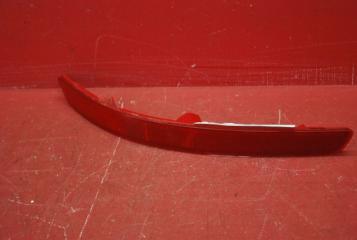 Отражатель в бампер задний левый Kia Rio 3