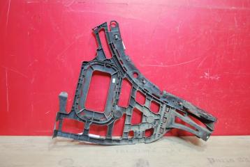 Фото запчасти кронштейн бампера задний Porsche Cayenne Б/У запчасть Запчасть кронштейн бампера задний Porsche Cayenne