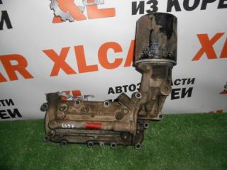 Фото запчасти корпус масляного фильтра с теплообменником Hyundai Grand Starex 2009 контрактная запчасть Запчасть корпус масляного фильтра с теплообменником Hyundai Grand Starex 2009