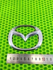 Эмблема задняя Mazda Demio 2002- 2007