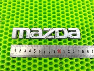 Эмблема задняя Mazda Demio 2002- 2007