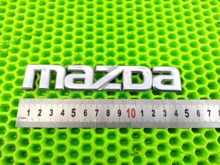 Эмблема задняя Mazda Demio 2002- 2007