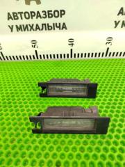 Фонарь освещения номерного знака задний Opel Astra GTC 2004-2009